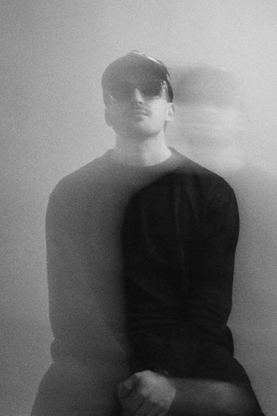 Motion blur black and white portrait with ethereal double exposure effect